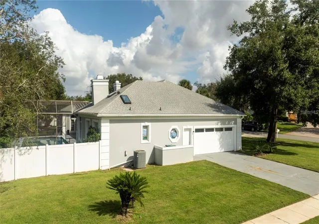 Photo 3 of Single family home for sale at 5646 Masters Blvd, Orlando, FL 32819 | MLS# O6415354 | Listing updated on 2026-08-20