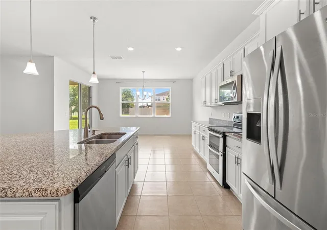 Photo 3 of Single family home for sale at 12135 Carson Dr, Orlando, FL 32824 | MLS# O6415381 | Listing updated on 2026-08-30