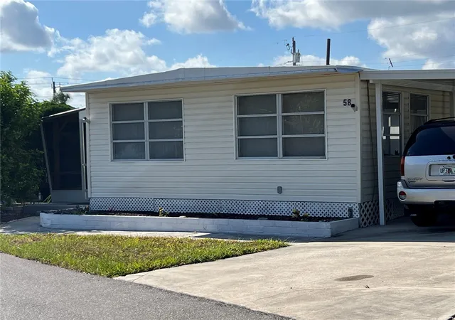 Photo 1 of Manufactured home for sale at 1100 University Pkwy #58, Sarasota, FL 34234 | MLS# A4696562 | Listing updated on 2026-06-27