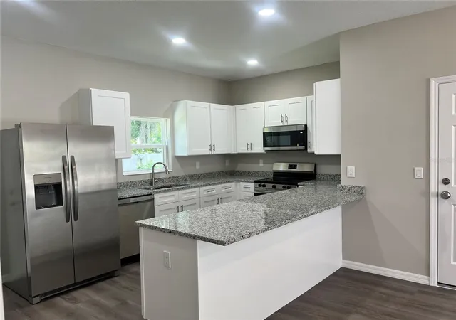 Photo 3 of Single family home for sale at 5008 Finders Ct, Tampa, FL 33617 | MLS# TB8517596 | Listing updated on 2026-10-03