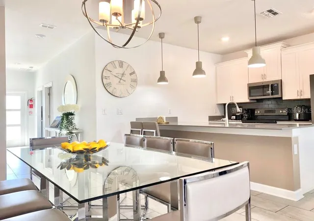 Photo 2 of Townhouse for sale at 8955 Cabot Cliffs Dr, Davenport, FL 33896 | MLS# O6415509 | Listing updated on 2026-07-03