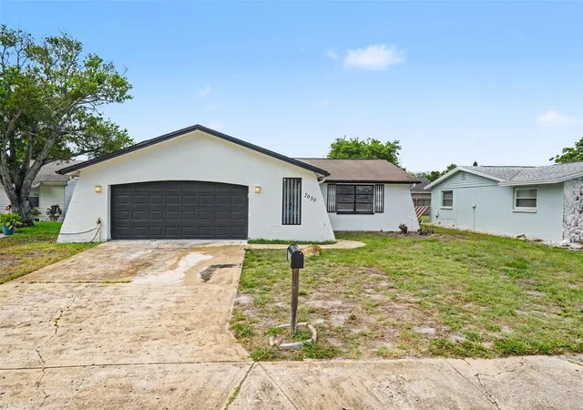 Photo 1 of Single family home for sale at 7030 Ingleside Dr, Port Richey, FL 34668 | MLS# O6415518 | Listing updated on 2026-10-07