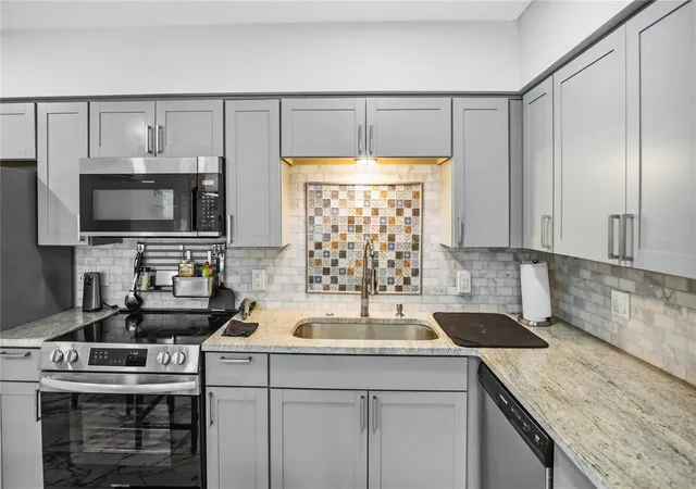Listing Photo 4 - Condo for sale in building located at 416 73Rd Ave N, St. Petersburg, FL 33702 - Unit #207