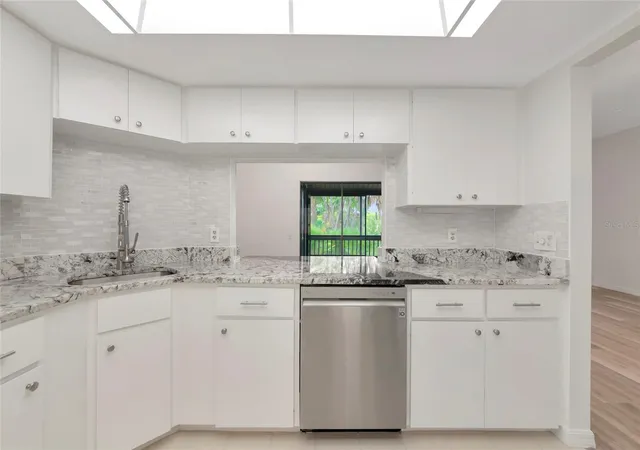 Photo 3 of Condo for sale at 116 Woodland Pl #116, Osprey, FL 34229 | MLS# A4696616 | Listing updated on 2026-09-23