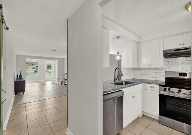 Listing Photo 4 - Condo for sale in building located at 4115 Hampton Dr, NEW PORT RICHEY, FL 34652 - Unit #n/a