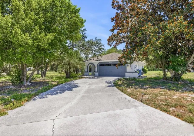 1st image of 10186 Sleepy Willow Ct, Spring Hill, FL 34608 | MLS# TB8517714