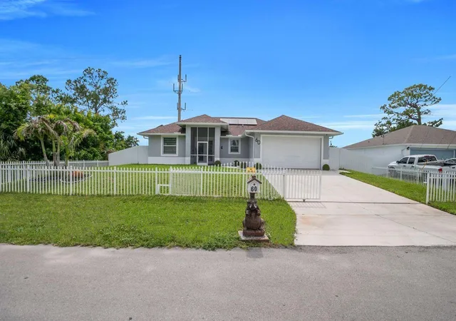 1st image of 60 Floyd Ave S, Lehigh Acres, FL 33976 | MLS# A4696647