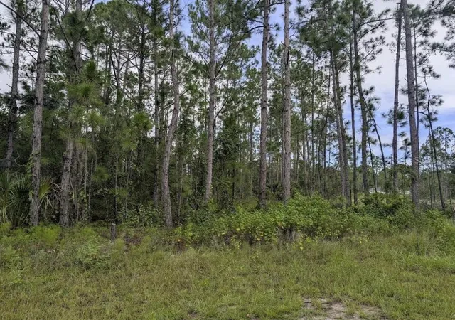 1st image of 1122 Poinciana Dr, Indian Lake Estates, FL 33855 | MLS# P4939007