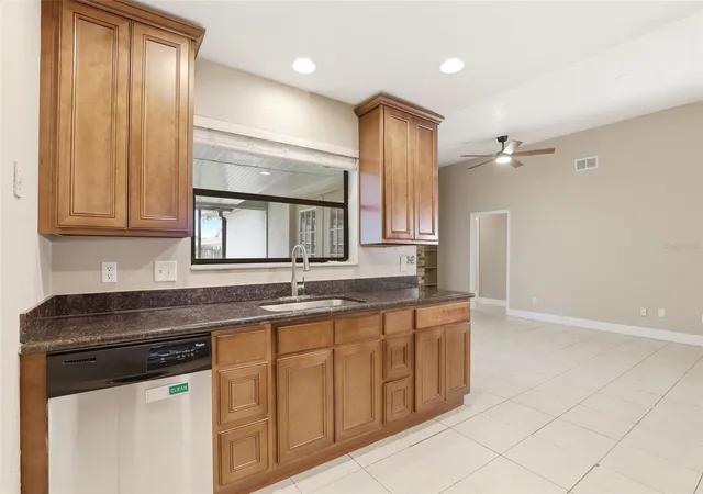 Photo 2 of Single family home for sale at 7320 Wethersfield Dr, Orlando, FL 32819 | MLS# O6415728 | Listing updated on 2026-08-30