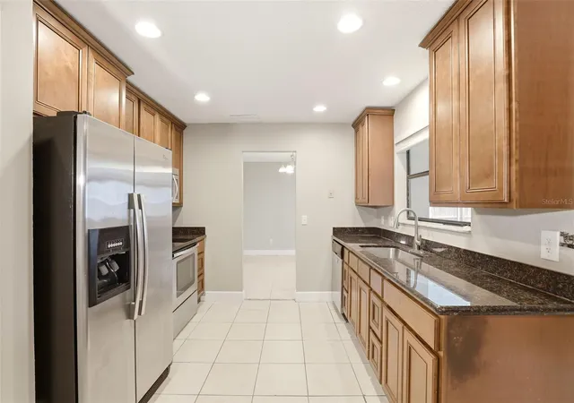 Photo 2 of Single family home for sale at 7320 Wethersfield Dr, Orlando, FL 32819 | MLS# O6415728 | Listing updated on 2026-08-30