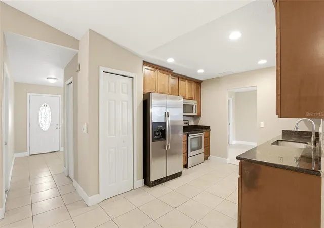 Photo 4 of Single family home for sale at 7320 Wethersfield Dr, Orlando, FL 32819 | MLS# O6415728 | Listing updated on 2026-08-30