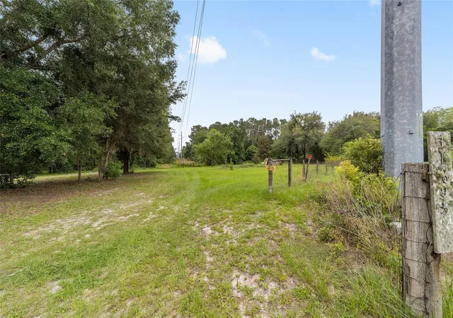 1st image of 11895 Se 136th Ct, Ocklawaha, FL 32179 | MLS# OM726397