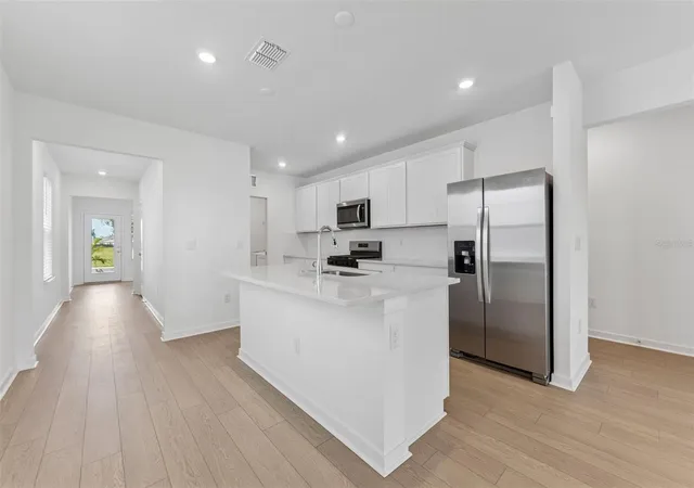 5th image of 33511 Binding Ties Ln, Wesley Chapel, FL 33545 | MLS# TB8517943