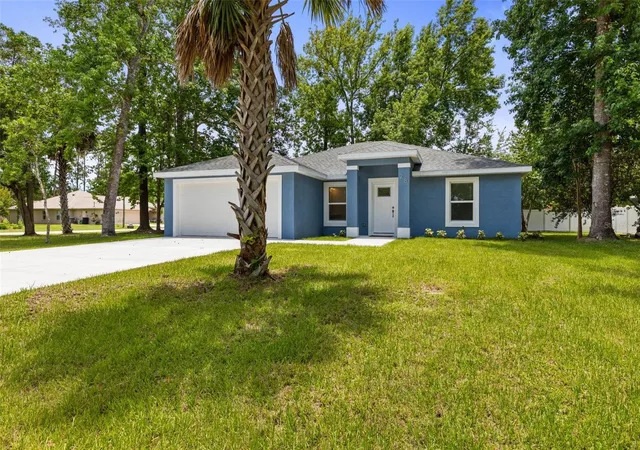 Photo 1 of Single family home for sale at 28 Woodston Ln, Palm Coast, FL 32164 | MLS# FC319204 | Listing updated on 2026-09-02
