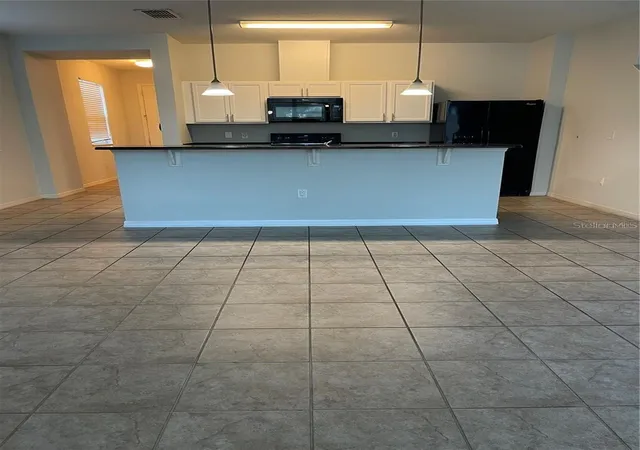 Photo 4 of Townhouse for sale at 3129 Tocoa Cir, Kissimmee, FL 34746 | MLS# O6415821 | Listing updated on 2026-07-01