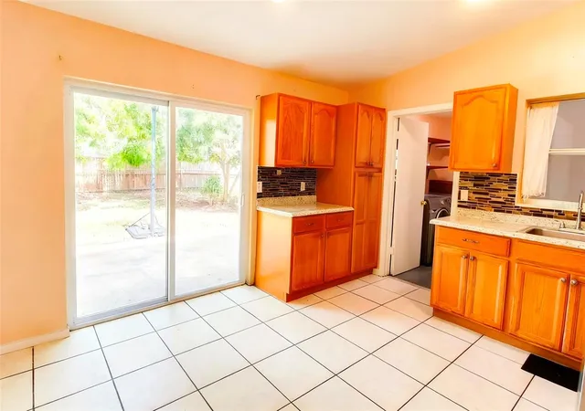 Photo 3 of Sale Pending at 3633 Ranchwood Rd, Orlando, FL 32808 | MLS# O6415830 | Listing updated on 2026-08-12