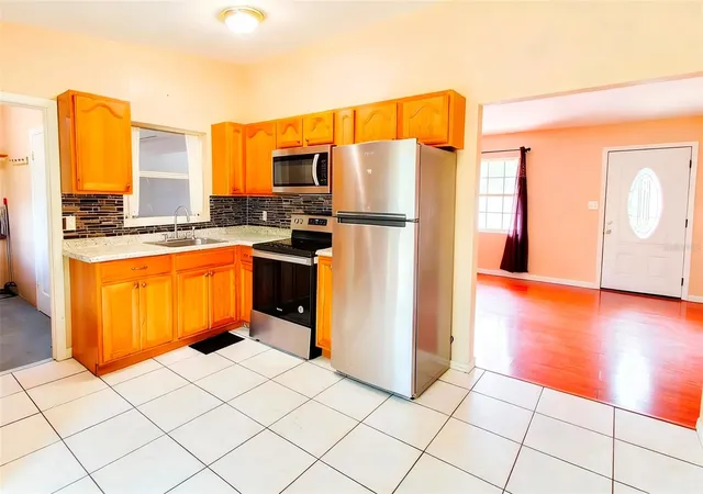 Photo 4 of Sale Pending at 3633 Ranchwood Rd, Orlando, FL 32808 | MLS# O6415830 | Listing updated on 2026-08-12