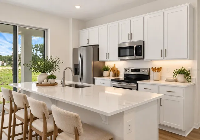 Photo 4 of Townhouse for sale at 1156 Cypress Elm Dr, Deland, FL 32720 | MLS# W7886643 | Listing updated on 2026-09-25