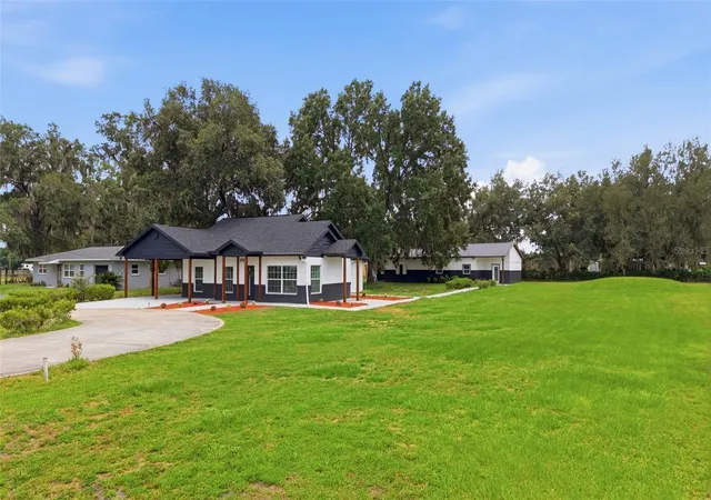 Photo 3 of Single family home for sale at 1205 E Knights Griffin Rd, Plant City, FL 33565 | MLS# TB8518134 | Listing updated on 2026-08-19