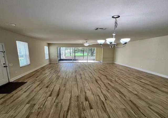Photo 3 of Townhouse for sale at 6058 Twain St #101, Orlando, FL 32835 | MLS# O6415953 | Listing updated on 2026-09-14