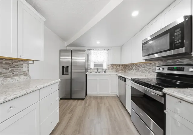 Photo 3 of Single family home for sale at 9316 Mark Twain Ln, Port Richey, FL 34668 | MLS# TB8518178 | Listing updated on 2026-10-02