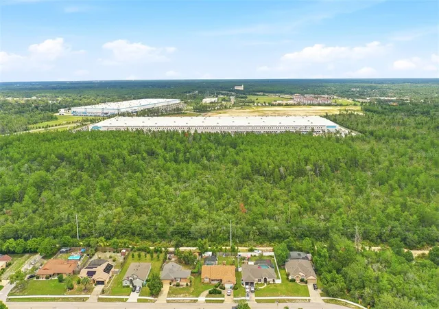 1st image of Wolverine (paper) Ave, Deltona, FL 32725 | MLS# O6415997