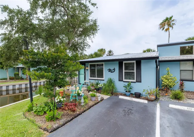 Photo 1 of Condo for sale at 100 Poinciana Cvs Ct #100, New Smyrna Beach, FL 32169 | MLS# O6416012 | Listing updated on 2026-08-04