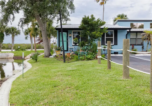 Photo 2 of Condo for sale at 100 Poinciana Cvs Ct #100, New Smyrna Beach, FL 32169 | MLS# O6416012 | Listing updated on 2026-08-04
