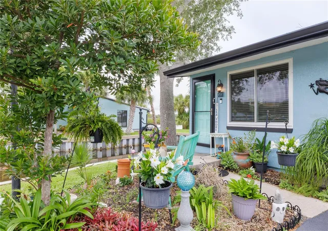 Photo 3 of Condo for sale at 100 Poinciana Cvs Ct #100, New Smyrna Beach, FL 32169 | MLS# O6416012 | Listing updated on 2026-08-04