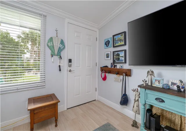 Photo 4 of Condo for sale at 100 Poinciana Cvs Ct #100, New Smyrna Beach, FL 32169 | MLS# O6416012 | Listing updated on 2026-08-04