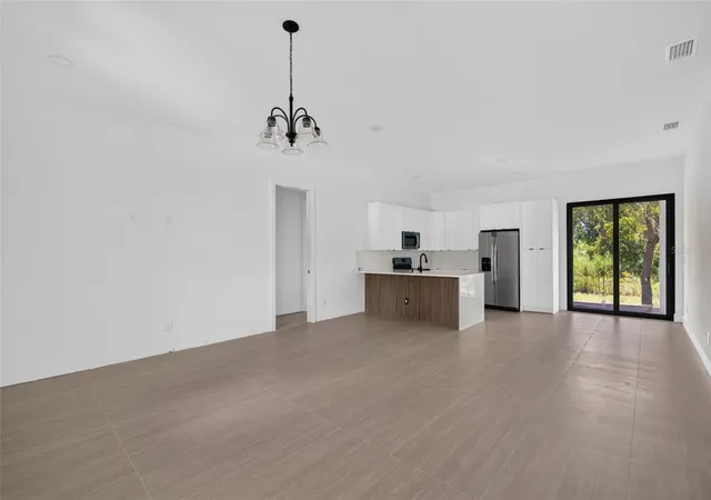 Photo 4 of Single family home for sale at 22333 Elmira Blvd, Port Charlotte, FL 33952 | MLS# O6416052 | Listing updated on 2026-09-04