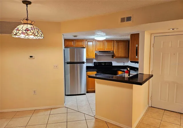 Photo 3 of Condo for sale at 1916 Lake Atriums Cir #25, Orlando, FL 32839 | MLS# O6416084 | Listing updated on 2026-08-31