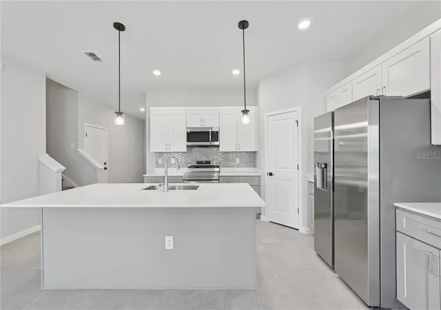 Photo 2 of Single family home for sale at 84 Springwood Dr, Palm Coast, FL 32137 | MLS# FC319227 | Listing updated on 2026-10-25