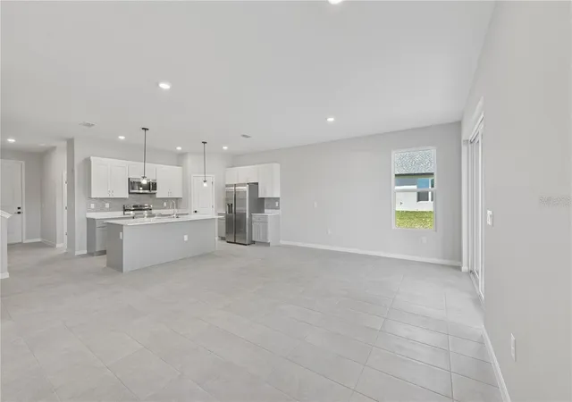 Photo 3 of Single family home for sale at 84 Springwood Dr, Palm Coast, FL 32137 | MLS# FC319227 | Listing updated on 2026-10-25
