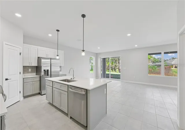 Photo 4 of Single family home for sale at 84 Springwood Dr, Palm Coast, FL 32137 | MLS# FC319227 | Listing updated on 2026-10-25
