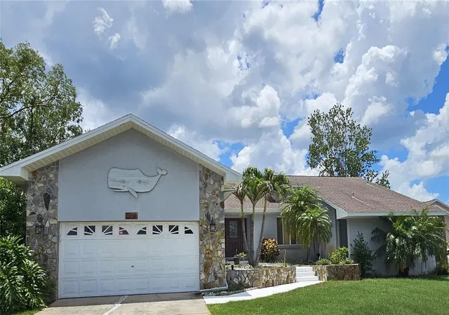 Photo 3 of Single family home for sale at 2210 Bayou Dr, Holiday, FL 34691 | MLS# TB8518437 | Listing updated on 2026-10-01