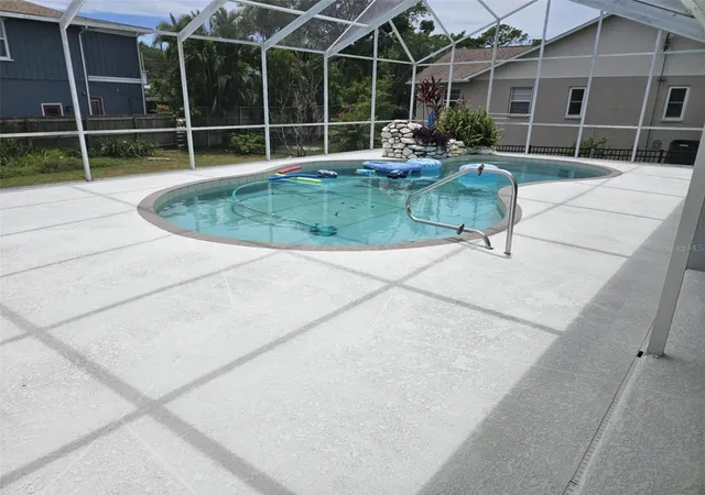 Photo 4 of Single family home for sale at 2210 Bayou Dr, Holiday, FL 34691 | MLS# TB8518437 | Listing updated on 2026-10-01
