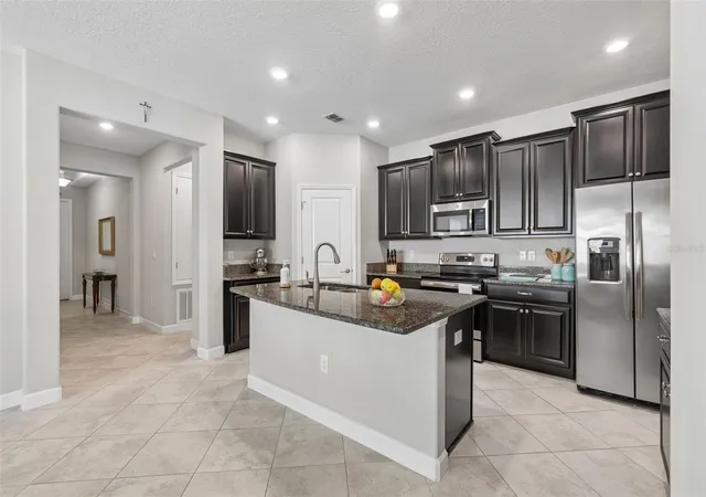 Photo 4 of Single family home for sale at 9908 Sage Crk Dr, Sun City Center, FL 33573 | MLS# TB8518575 | Listing updated on 2026-09-16
