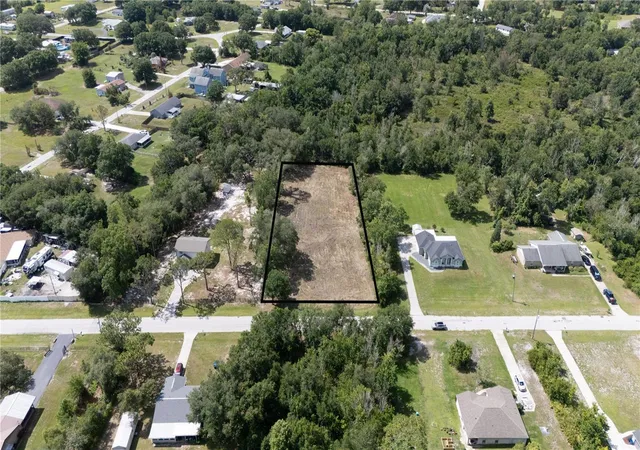 1st image of 0 Hedgerow Dr, Wesley Chapel, FL 33543 | MLS# TB8518723