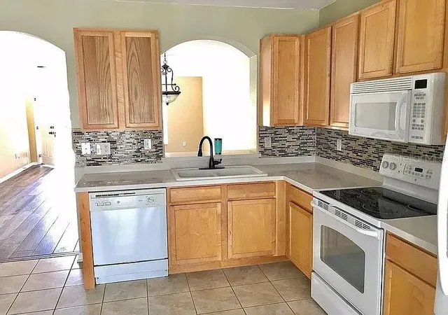 Photo 3 of Townhouse for sale at 15647 Stable Run Dr, Spring Hill, FL 34610 | MLS# TB8518822 | Listing updated on 2026-06-14