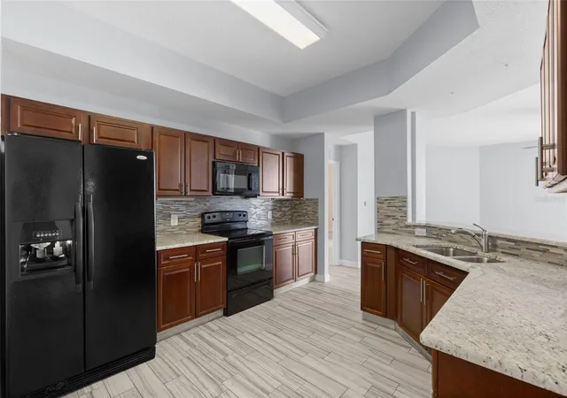 Photo 1 of Condo for sale at 6336 Buford St #801, Orlando, FL 32835 | MLS# O6416544 | Listing updated on 2026-08-06