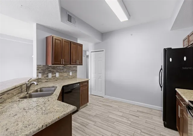Photo 2 of Condo for sale at 6336 Buford St #801, Orlando, FL 32835 | MLS# O6416544 | Listing updated on 2026-08-06