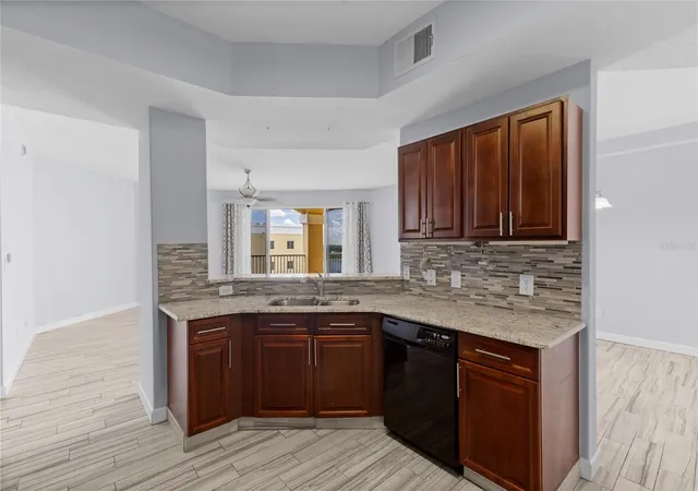 Photo 3 of Condo for sale at 6336 Buford St #801, Orlando, FL 32835 | MLS# O6416544 | Listing updated on 2026-08-06