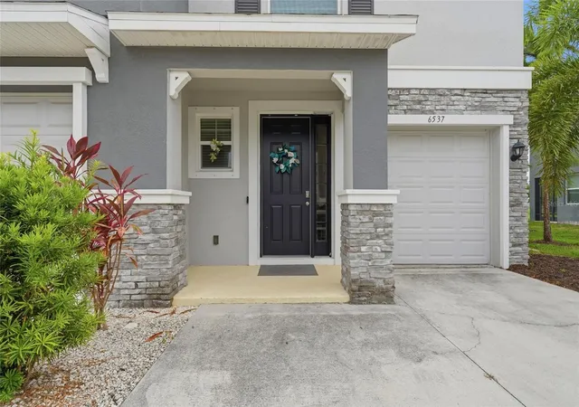 Photo 3 of Townhouse for sale at 6537 Serenity Fall Ln, Sarasota, FL 34240 | MLS# A4696971 | Listing updated on 2026-06-24