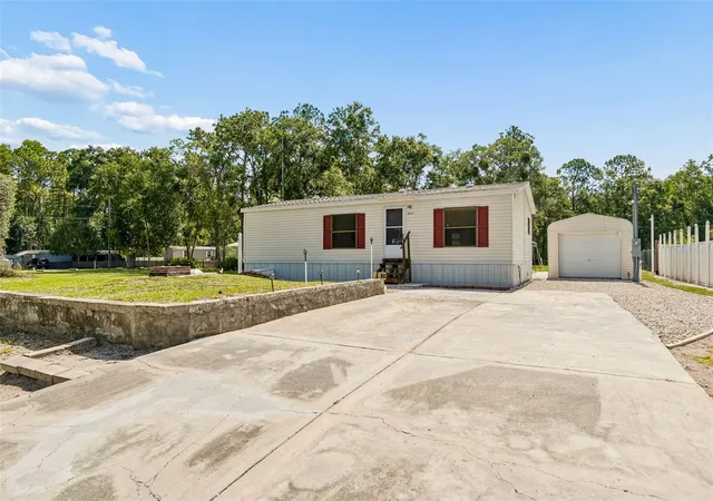 Photo 3 of Manufactured home for sale at 10654 Holgate St, New Port Richey, FL 34654 | MLS# TB8518869 | Listing updated on 2026-08-08