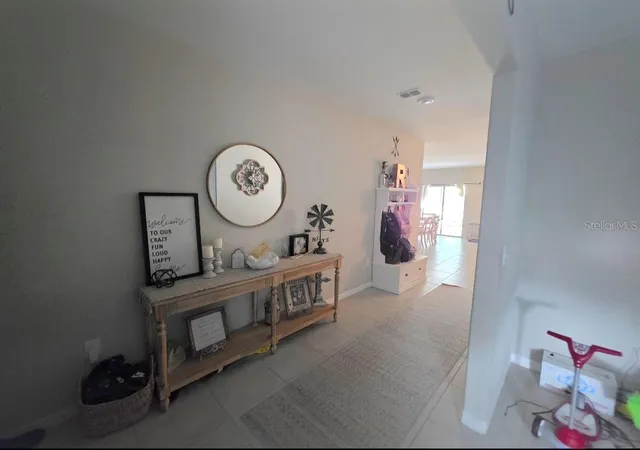 Photo 3 of Single family home for sale at 1561 Flower Dust Dr, Ruskin, FL 33570 | MLS# TB8519037 | Listing updated on 2026-08-27