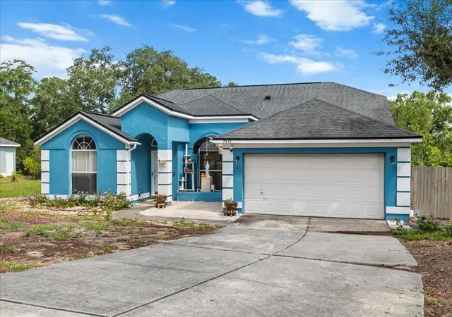 Photo 3 of Single family home for sale at 7045 Coral Cvs Dr, Orlando, FL 32818 | MLS# S5151872 | Listing updated on 2026-08-29
