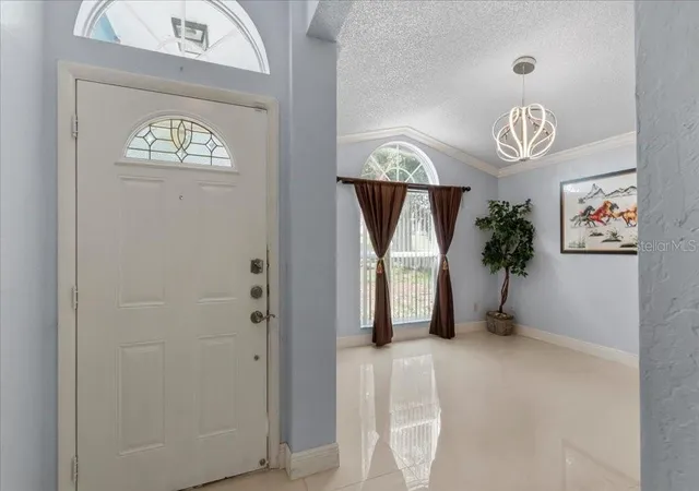 Photo 4 of Single family home for sale at 7045 Coral Cvs Dr, Orlando, FL 32818 | MLS# S5151872 | Listing updated on 2026-08-29