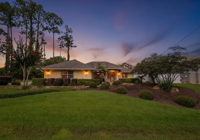Photo 3 of Single family home for sale at 30 Evans Dr, Palm Coast, FL 32164 | MLS# FC319266 | Listing updated on 2026-09-14