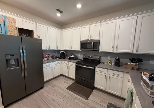 Photo 2 of Townhouse for sale at 9896 Red Eagle Dr, Orlando, FL 32825 | MLS# O6416778 | Listing updated on 2026-08-18